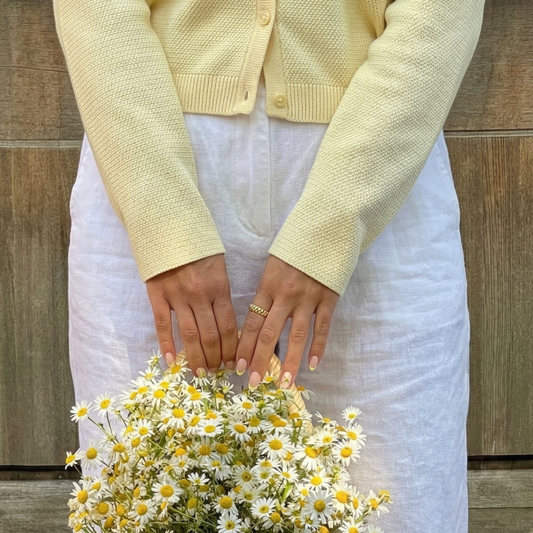 Well-groomed nails in a natural nude shade with 21FREE+ gel polish